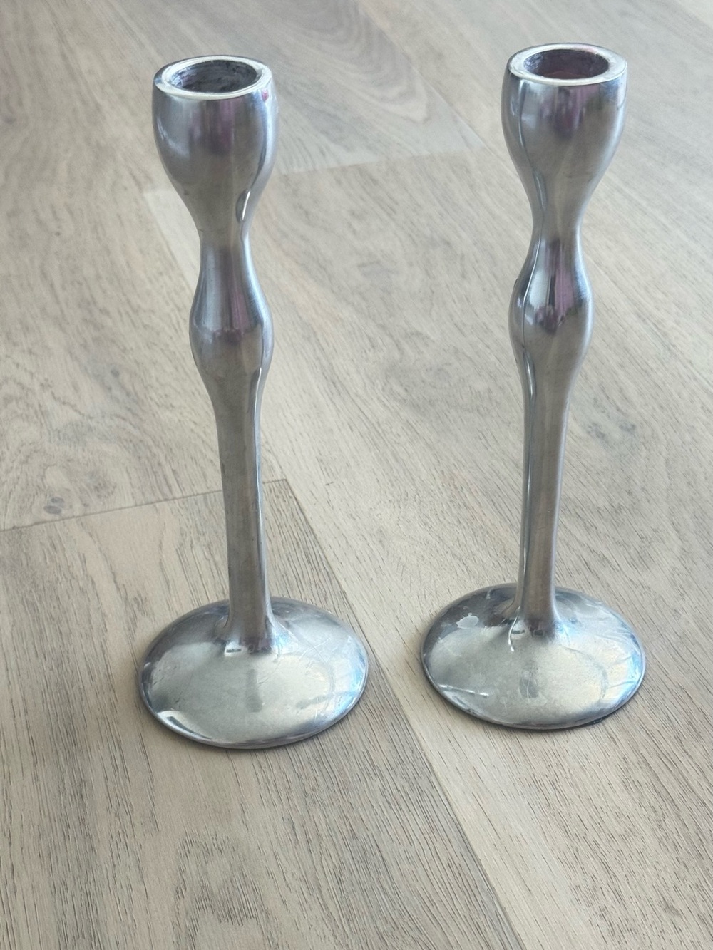 A pair of Vintage Metal Candlestick Holders Silver colour MCM